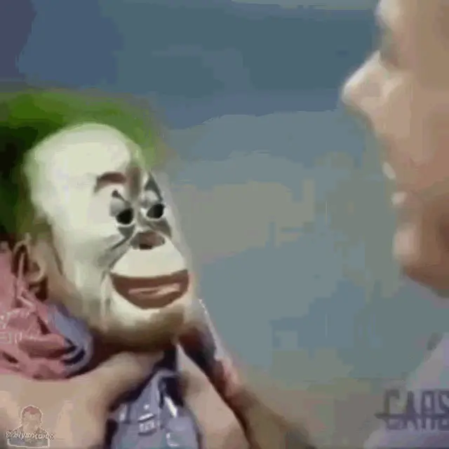 Man interacts with Monke Clown puppet
